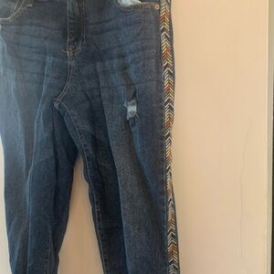 Knox Rose jeans size 8 embroidery down both sides of the jeans.